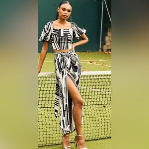 Diarrablu black and white print top ( Large) w/ matching skirt (XL) MSRP $320